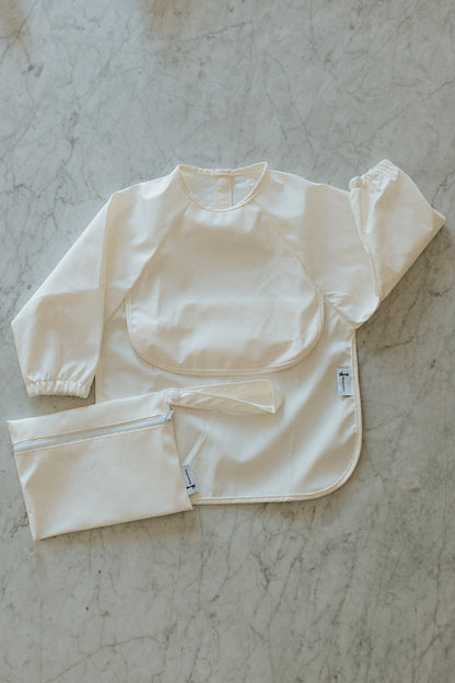 Bavette à manches longues avec pochette intégrée