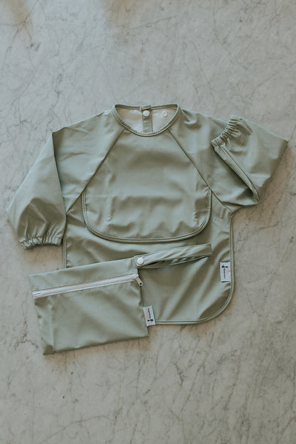 Bavette à manches longues avec pochette intégrée