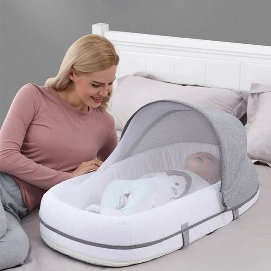 Lit de voyage bébé pliable avec moustiquaire – Nid de sommeil portable pour nouveau‑nés